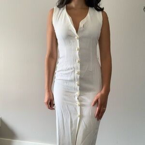 Vintage woman’s long white button  up dress with gold accent buttons sleeveless